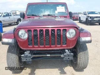 2021 Jeep Gladiator Sport S with VIN 1C6HJTAG8ML542343, listed as a IAAI auction lot 42317089 with 56,354 mi miles and . Bid and sale history available at DreamBid. Image 6.
