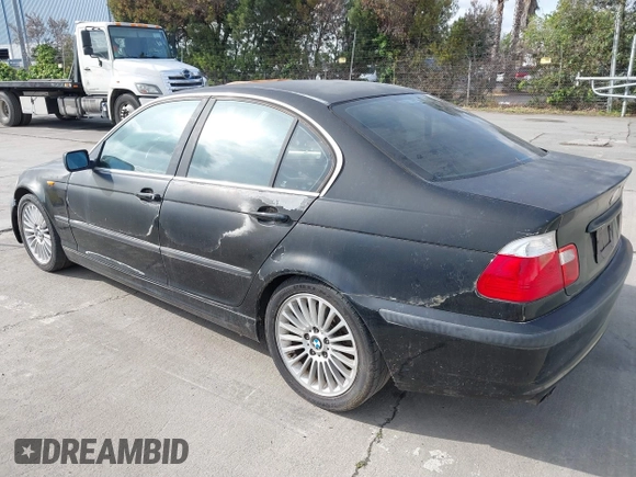 2003 BMW 3 Series 330i with VIN WBAEV534X3KM29039, listed as a IAAI auction lot 41850238 with 127,791 mi miles. Bid and sale history available at carsss.com. Image 3.
