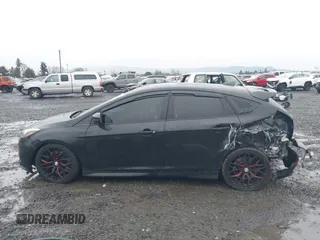 2014 Ford Focus ST with VIN 1FADP3L91EL441379, listed as a IAAI auction lot 41092598 with 58,670 mi miles and . Bid and sale history available at carsss.com. Image 14.