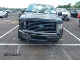 2014 Ford F-150 XL with VIN 1FTEX1CM4EKF42963, listed as a IAAI auction lot 42593646 with 143,409 mi miles and . Bid and sale history available at DreamBid. Image 12.
