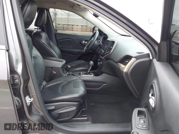 2014 Jeep Cherokee Limited with VIN 1C4PJLDS9EW241875, listed as a IAAI auction lot 42062856 with 90,052 mi miles and . Bid and sale history available at DreamBid. Image 5.