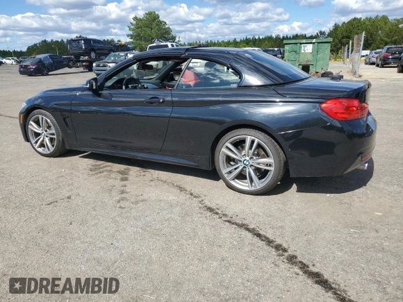 2014 BMW 4 Series 435i with VIN WBA3T3C59EP736749, listed as a Copart auction lot 76011404 with 48,815 mi miles and Salvage title. Bid and sale history available at DreamBid. Image 2.
