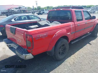 2002 Nissan Frontier XE with VIN 1N6ED29Y72C322664, listed as a IAAI auction lot 42856921 with 345,377 mi miles and . Bid and sale history available at DreamBid. Image 4.