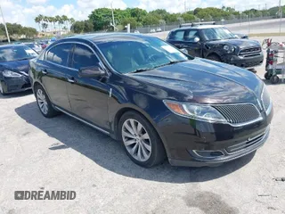 2014 Lincoln MKS with VIN 1LNHL9EK0EG608300, listed as a IAAI auction lot 41900902 with 144,253 mi miles. Bid and sale history available at carsss.com. Image 1.