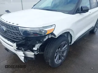 2022 Ford Explorer XLT z VIN 1FMSK7DHXNGB35329, wystawiony jako IAAI lot #42221442 z przebiegiem 56 655 mil mil oraz . Historia ofert i sprzedaży dostępna na DreamBid. Obrazek 6.
