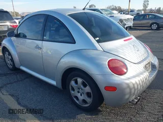 2003 Volkswagen New Beetle Coupe GLS with VIN 3VWCK21C53M418371, listed as a IAAI auction lot 41479358 with 148,867 mi miles. Bid and sale history available at carsss.com. Image 3.