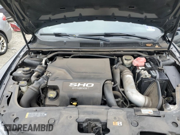 2015 Ford Taurus SHO with VIN 1FAHP2KT2FG188060, listed as a Copart auction lot 48952155 with 93,092 mi miles and Salvage Title. Bid and sale history available at DreamBid. Image 11.