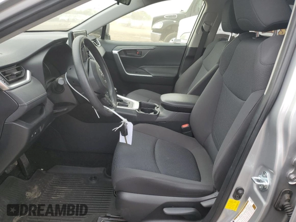 2019 Toyota RAV4 LE with VIN JTMH1RFV7KJ003899, listed as a Copart auction lot 52204315 with 27,491 mi miles and Salvage Title. Bid and sale history available at carsss.com. Image 7.