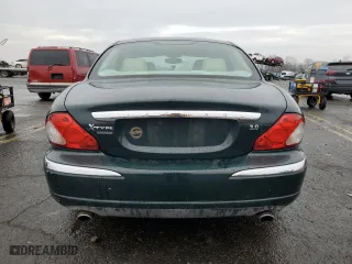 2004 Jaguar X-Type with VIN SAJEA51C84WD57149, listed as a Copart auction lot 82661344 with 146,574 mi miles and Salvage Title. Bid and sale history available at carsss.com. Image 6.