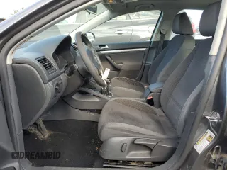 2009 Volkswagen Jetta z VIN 3VWHZ71KX9M011693, wystawiony jako Copart lot #87076904 z przebiegiem 157 478 mil mil oraz Szkoda całkowita • Salvage title. Historia ofert i sprzedaży dostępna na DreamBid. Obrazek 7.