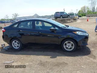 2019 Ford Fiesta SE with VIN 3FADP4BJ2KM165435, listed as a IAAI auction lot 42077508 with 118,784 mi miles. Bid and sale history available at carsss.com. Image 14.