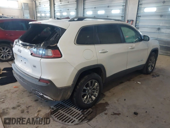 2020 Jeep Cherokee Altitude with VIN 1C4PJMLN6LD647106, listed as a IAAI auction lot 41406440 with 58,788 mi miles. Bid and sale history available at carsss.com. Image 4.