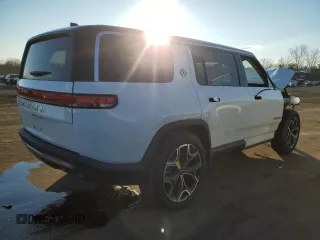 2023 Rivian R1S Launch Edition z VIN 7PDSGABL1PN005988, wystawiony jako Copart lot #42556295 z przebiegiem 19 894 mil mil oraz Szkoda całkowita • Salvage title. Historia ofert i sprzedaży dostępna na DreamBid. Obrazek 3.