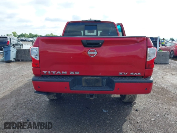 2023 Nissan Titan Pro-4X with VIN 1N6AA1FB9PN104089, listed as a IAAI auction lot 42202488 with 58,151 mi miles and . Bid and sale history available at DreamBid. Image 16.