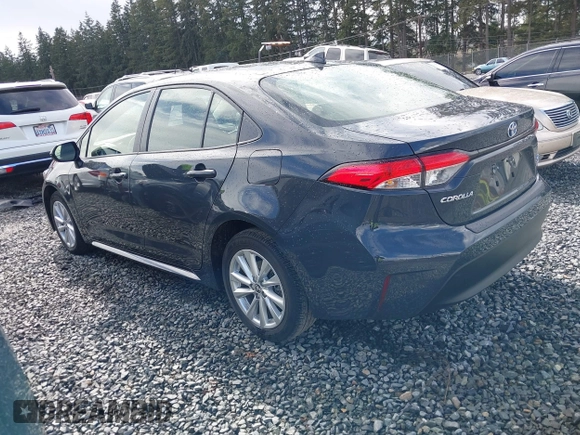 2023 Toyota Corolla Hybrid LE with VIN JTDBCMFE8P3022489, listed as a IAAI auction lot 41766861 with 44,571 mi miles. Bid and sale history available at carsss.com. Image 3.