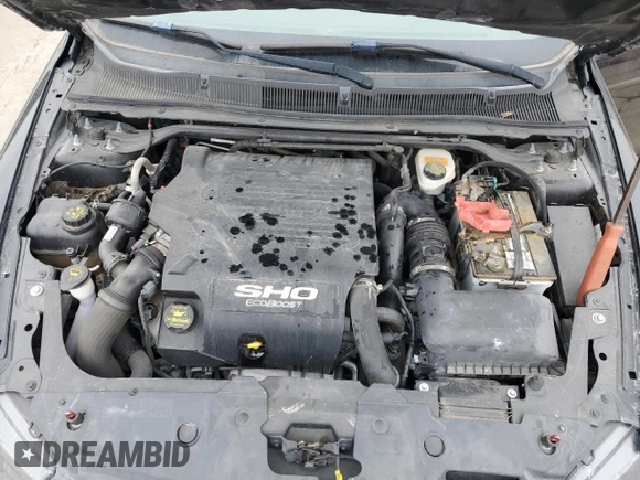 2014 Ford Taurus SHO with VIN 1FAHP2KT4EG116744, listed as a Copart auction lot 44947915 with 138,757 mi miles and Clean Title. Bid and sale history available at carsss.com. Image 11.