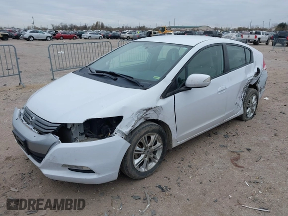 2010 Honda Insight EX with VIN JHMZE2H71AS035091, listed as a IAAI auction lot 41380128 with 181,653 mi miles and . Bid and sale history available at DreamBid. Image 2.