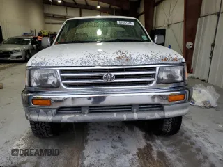 1997 Toyota T100 SR5 with VIN JT4UN24D9V0048079, listed as a Copart auction lot 87042344 with 303,785 mi miles and Salvage Title. Bid and sale history available at DreamBid. Image 5.