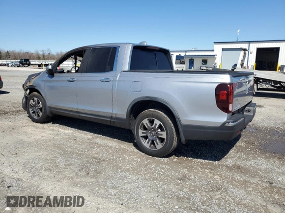 2019 Honda Ridgeline RTL-E with VIN 5FPYK3F77KB015092, listed as a Copart auction lot 48459345 with Not provided miles and Salvage title. Bid and sale history available at DreamBid. Image 2.