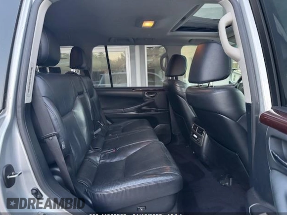 2013 Lexus LX 570 with VIN JTJHY7AX8D4089490, listed as a IAAI auction lot 41368252 with 203,267 mi miles and . Bid and sale history available at DreamBid. Image 7.
