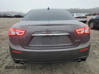 2016 Maserati Ghibli z VIN ZAM57XSA7G1168458, wystawiony jako Copart lot #43611465 z przebiegiem 98 110 mil mil oraz Szkody całkowita. Historia ofert i sprzedaży dostępna na DreamBid. Obrazek 6.