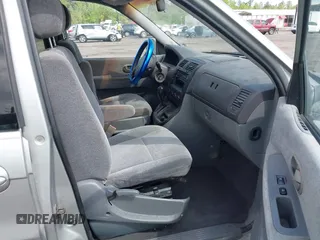 2003 Kia Sedona LX with VIN KNDUP131236417368, listed as a IAAI auction lot 41863624 with 142,896 mi miles. Bid and sale history available at carsss.com. Image 5.