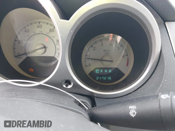 2008 Chrysler Sebring with VIN 1C3LC66J68N284521, listed as a IAAI auction lot 41508199 with 217,216 mi miles and . Bid and sale history available at DreamBid. Image 7.