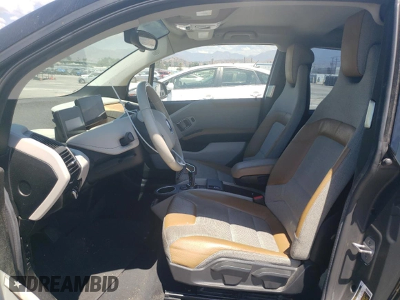 2016 BMW i3 with VIN WBY1Z4C53GV506572, listed as a Copart auction lot 63569273 with 56,936 mi miles. Bid and sale history available at carsss.com. Image 7.
