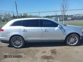 2015 Lincoln MKT EcoBoost with VIN 2LMHJ5AT4FBL00959, listed as a IAAI auction lot 41991763 with 159,687 mi miles and . Bid and sale history available at DreamBid. Image 13.