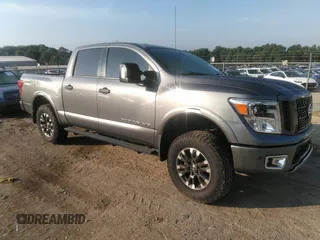 2019 Nissan Titan Platinum Reserve z VIN 1N6AA1E55KN534951, wystawiony jako IAAI lot #42617999 z przebiegiem 45 973 mil mil oraz . Historia ofert i sprzedaży dostępna na DreamBid. Obrazek 1.