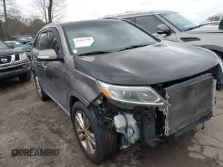 2015 Kia Sorento SX with VIN 5XYKW4A74FG603479, listed as a IAAI auction lot 41515797 with 151,496 mi miles. Bid and sale history available at carsss.com. Image 1.