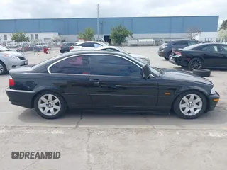 2002 BMW 3 Series 325Ci with VIN WBABN33482JW53230, listed as a IAAI auction lot 41912031 with 211,631 mi miles. Bid and sale history available at carsss.com. Image 13.