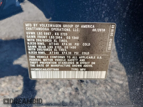 2018 Volkswagen Atlas SEL Premium z VIN 1V2NR2CA6JC577688, wystawiony jako Copart lot #60800465 z przebiegiem 82 841 mil mil oraz Szkoda całkowita • Salvage title. Historia ofert i sprzedaży dostępna na DreamBid. Obrazek 13.