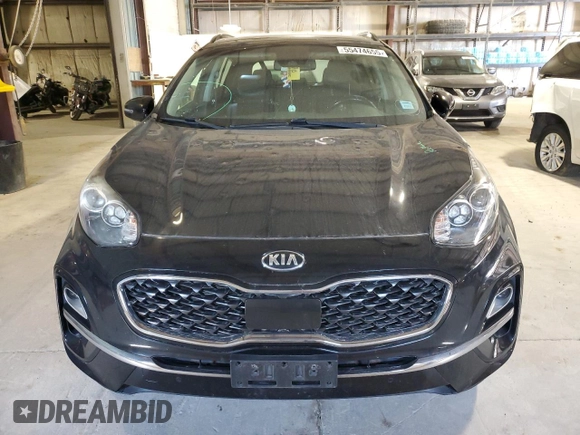 2020 Kia Sportage EX with VIN KNDPNCAC7L7631897, listed as a Copart auction lot 55474655 with 114,403 mi miles and Salvage title. Bid and sale history available at DreamBid. Image 5.