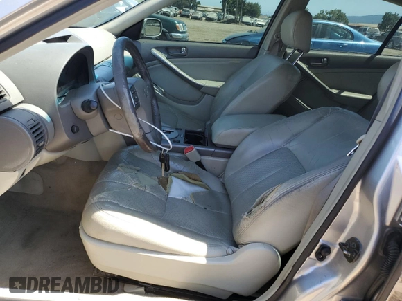 2003 Infiniti G35 w/Leather with VIN JNKCV51E03M001439, listed as a Copart auction lot 59347455 with 123,084 mi miles and Salvage title. Bid and sale history available at DreamBid. Image 7.