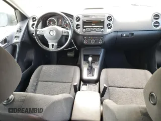 2014 Volkswagen Tiguan S z VIN WVGBV3AX2EW519798, wystawiony jako Copart lot #60316895 z przebiegiem 182 002 mil mil oraz Czysty tytuł • Clean title. Historia ofert i sprzedaży dostępna na DreamBid. Obrazek 8.