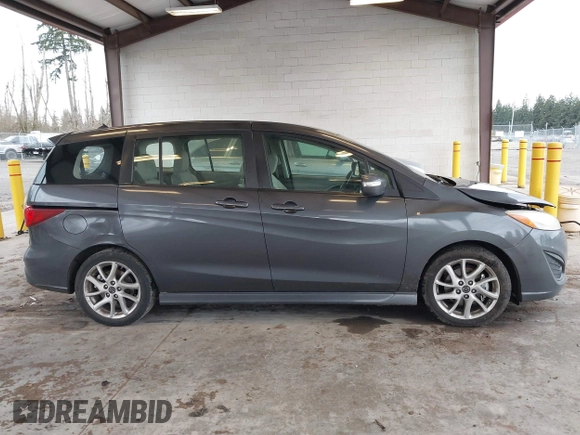 2014 Mazda 5 Touring with VIN JM1CW2CL7E0167945, listed as a IAAI auction lot 41624435 with 167,736 mi miles. Bid and sale history available at carsss.com. Image 13.