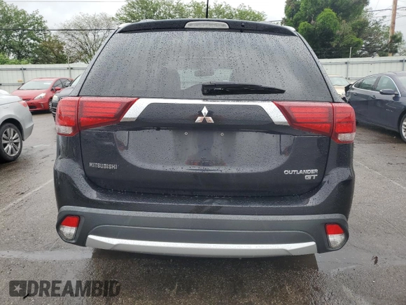 2016 Mitsubishi Outlander GT with VIN JA4JZ4AX1GZ051410, listed as a Copart auction lot 59039995 with 120,892 mi miles and Salvage title. Bid and sale history available at DreamBid. Image 6.