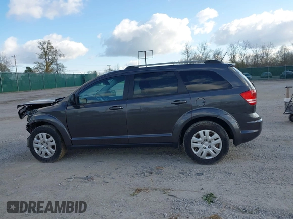 2017 Dodge Journey SE with VIN 3C4PDCAB0HT701477, listed as a IAAI auction lot 42025733 with 168,269 mi miles and . Bid and sale history available at DreamBid. Image 14.