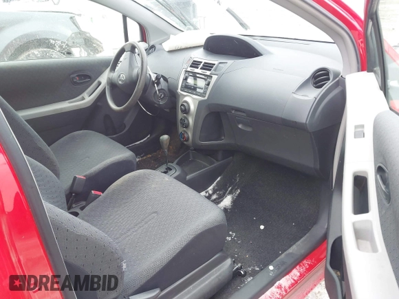 2011 Toyota Yaris with VIN JTDJT4K34B5329980, listed as a IAAI auction lot 41393540 with 84,987 mi miles. Bid and sale history available at carsss.com. Image 5.