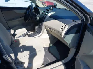 2012 Toyota Corolla L with VIN 5YFBU4EE8CP061390, listed as a IAAI auction lot 41872545 with 104,476 mi miles. Bid and sale history available at carsss.com. Image 5.