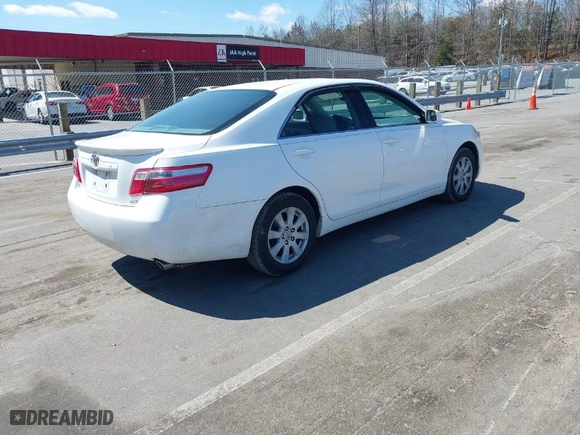 2007 Toyota Camry CE with VIN 4T1BE46K67U670953, listed as a IAAI auction lot 41894354 with 259,421 mi miles. Bid and sale history available at carsss.com. Image 4.