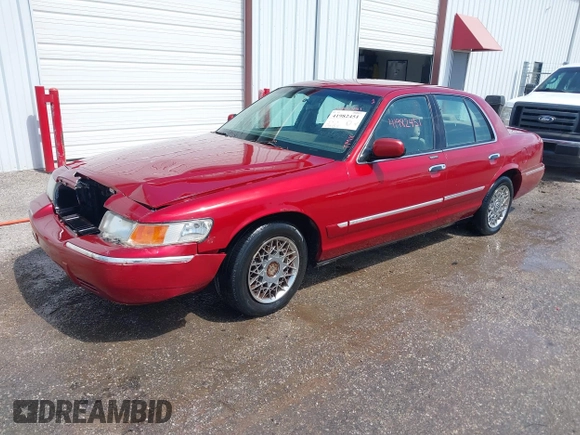 1999 Mercury Grand Marquis GS z VIN 2MEFM74W2XX635561, wystawiony jako IAAI lot #41982451 z przebiegiem 233 137 mil mil oraz . Historia ofert i sprzedaży dostępna na DreamBid. Obrazek 2.
