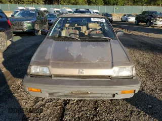 1986 Honda Civic z VIN JHMAH7329GS021008, wystawiony jako Copart lot #79475154 z przebiegiem 113 888 mil mil oraz Tytuł czysty. Historia ofert i sprzedaży dostępna na DreamBid. Obrazek 5.