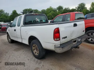 1999 Ford F-250 with VIN 1FTPX27L2XKA25342, listed as a Copart auction lot 53118315 with 384,756 mi miles and Salvage title. Bid and sale history available at DreamBid. Image 2.