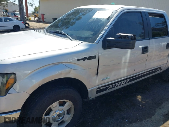 2014 Ford F-150 XL with VIN 1FTFW1CT3EKD12216, listed as a IAAI auction lot 42110775 with 140,673 mi miles. Bid and sale history available at carsss.com. Image 6.
