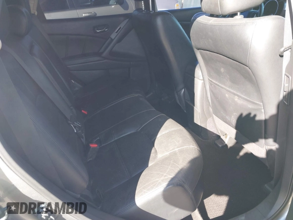 2013 Nissan Murano LE with VIN JN8AZ1MW7DW322852, listed as a IAAI auction lot 41574118 with 128,449 mi miles and . Bid and sale history available at DreamBid. Image 8.