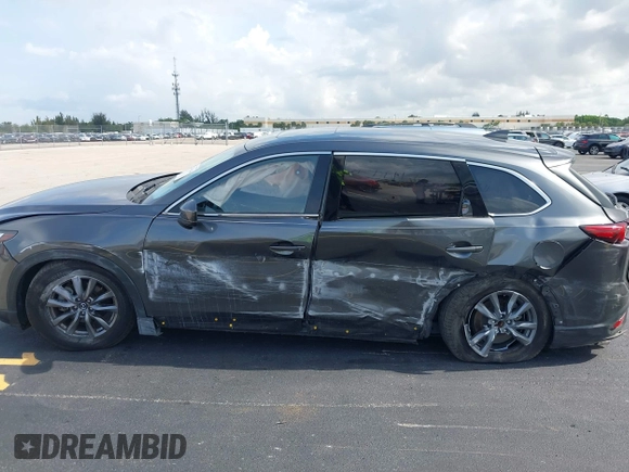 2021 Mazda CX-9 Touring с VIN JM3TCACY4M0511512, выставлен на аукционе IAAI как лот 42376544 с пробегом 50 485 миль миль и . История ставок и продаж доступна на DreamBid. Изображение 6.