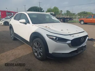 2023 Mazda CX-30 S Carbon Edition z VIN 3MVDMBCM4PM507456, wystawiony jako IAAI lot #42121156 z przebiegiem Nie podano mil oraz . Historia ofert i sprzedaży dostępna na DreamBid. Obrazek 1.
