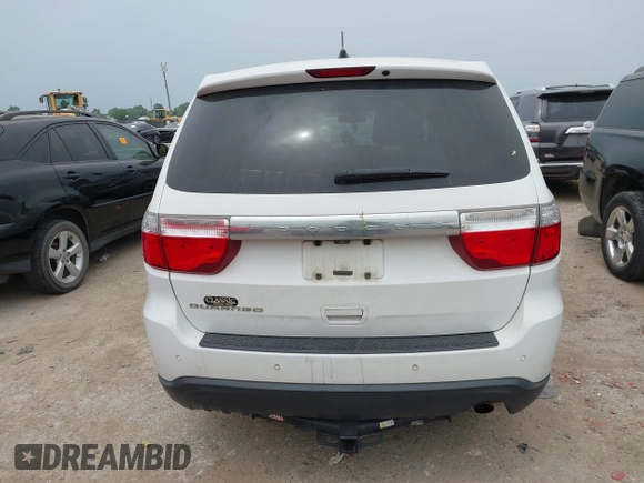 2013 Dodge Durango SXT z VIN 1C4RDHAG4DC598250, wystawiony jako IAAI lot #42076002 z przebiegiem 104 701 mil mil oraz . Historia ofert i sprzedaży dostępna na DreamBid. Obrazek 16.